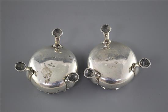 A pair of Georgian silver bun salts, circa, 1760-1780, (marks rubbed), diameter 65mm, 4.5oz.